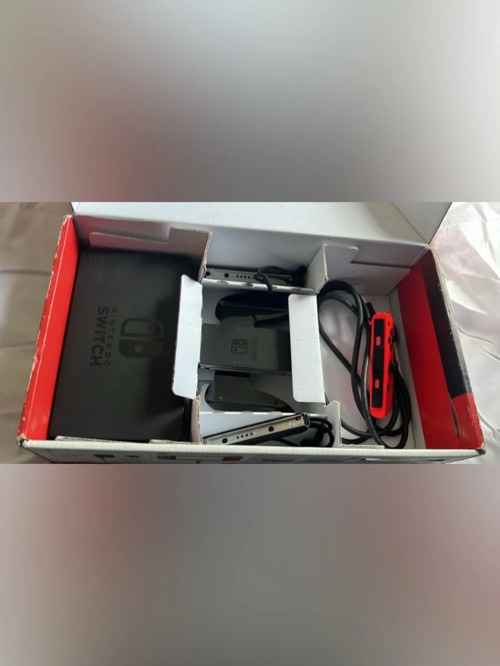 Nintendo Switch Console with Neon Red and Neon Blue Joy‑Con